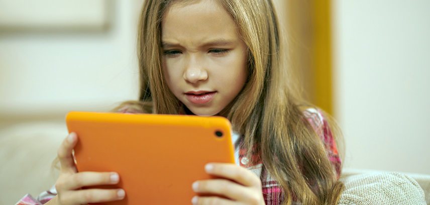 Young girl using tablet