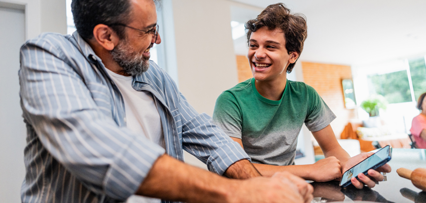 father and son discussing screen time rules
