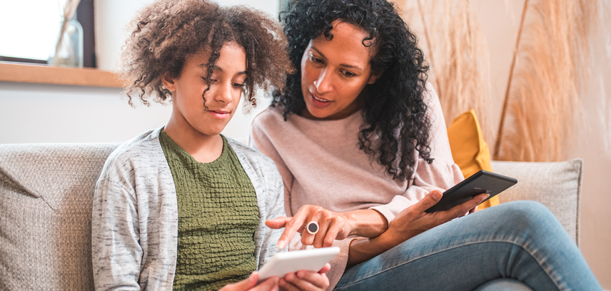 Mother and daughter talking about device use