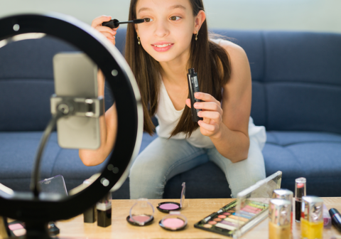 grwm, teen girl filming herself getting ready for social media