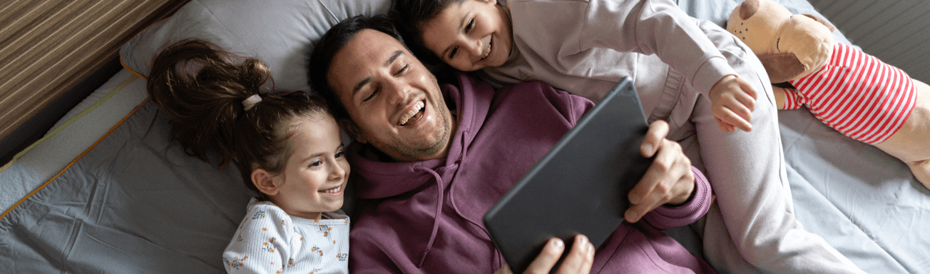 Dad and children using a tablet