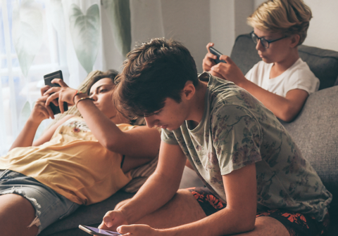 How do screens and technology affect social development?