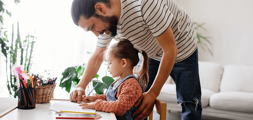 father helping daughter with homework