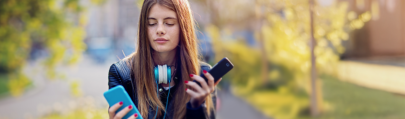 teenage girl using burner phone